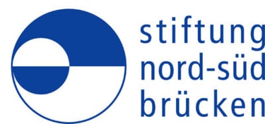 Blue and white logo for Stiftung Nord-Süd-Brücken with a geometric circular icon.