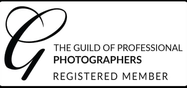 a logo for the guild of professional photographers