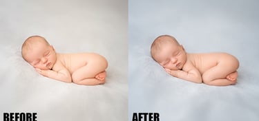 a baby sleeping on a blanket in a studio