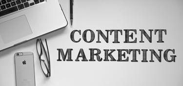 Laptop and Content Marketing sign representing marketing translations