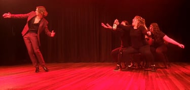 a group of people standing on a stage