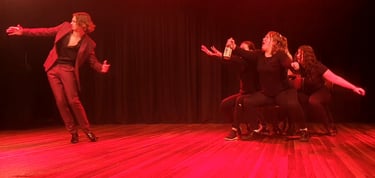 a group of people standing on a stage