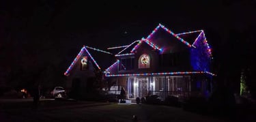 Welcoming home with twinkling Christmas lights, enhancing the festive ambiance for the holiday