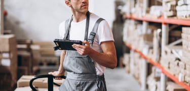 a man standing in a warehouse