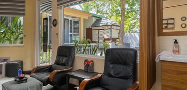 a living room with a view of a bathroom