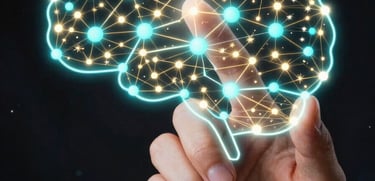 A detailed photograph of a hand touching a glowing holographic projection of a mind map. The nodes glow in electric cyan, while the connecting lines are starlight gold. The background is a deep, out-of-focus cosmic black.