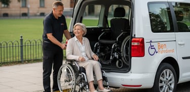 Fahrer von Ben Fahrdienst begleitet Kundin im Rollstuhl sicher zum Eingang des Krankenhauses.