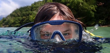 a woman in a diving mask and snorh snorg snorg