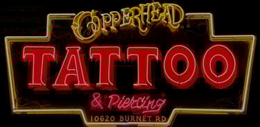 Copperhead Tattoos & Piercings neon sign