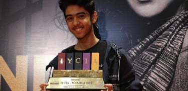 a man holding a plaque that says,'one of the best in the world