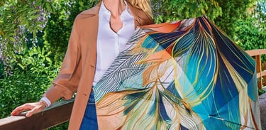 Women holding a colourful doppler umbrella