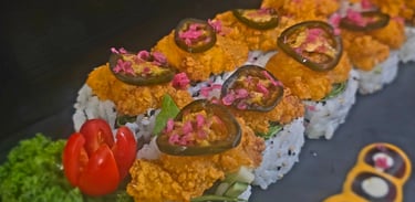 SR27 Chicken Karaage Roll $19.99 - avocado, cucumber, shiitake mushroom, jalapeno, lettuce with chicken karaage on top