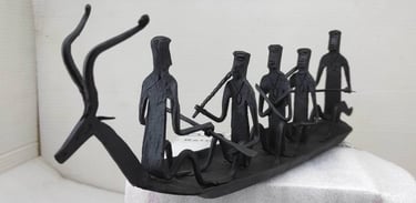 "Handcrafted tribal iron boat with 5 seated figures – Bastar Loha Shilp, left side view-Export-grade"