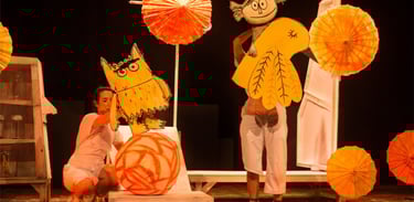 a woman in a yellow dress and a man in a white shirt