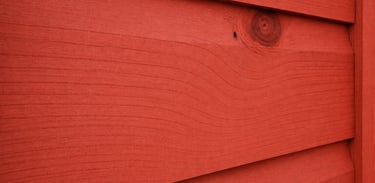 dutch lap siding painted with barn red paint