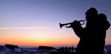Man playing trumpet on the Epynt for Easter Morning Service