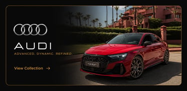 Red Audi RS3 luxury sedan for rent parked in front of a tropical resort with palm trees.