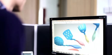 Designer showing his design work in front of computer