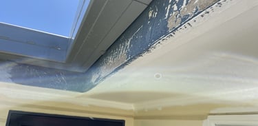 Peeling exterior paint under eaves before house repainting in Brisbane