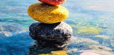 a stack of rocks sitting on top of a rock