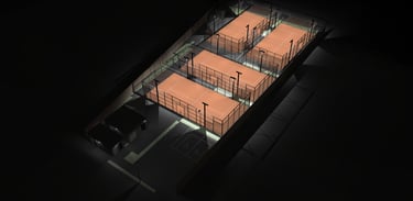 A floodlit padel court venue with 4 terracotta outdoor padel courts, a bar building and an office