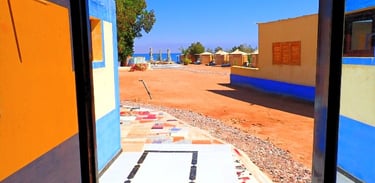 Studio door view of a beach with a view of the Red sea