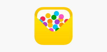 a yellow envelope with balloons floating in the air