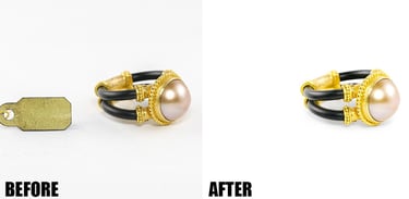 a pair of earrings with a pearl and gold ring