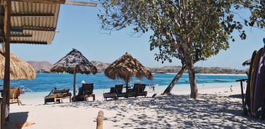 Beautiful view of Tanjung Aan Beach in Lombok with turquoise waters and soft white sand.