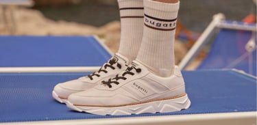 a person wearing bugatti socks