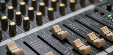Close-up of a high-end sound mixer with gold knobs and sliders, captured in a moody professional photography style.