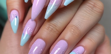 Close-up of a client's hands with freshly polished nails in soft pastel colors.