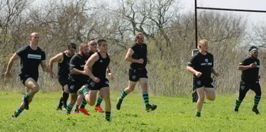 a group of men and women playing a game of rugby and running