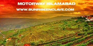 a scenic view of a mountain range in the sun