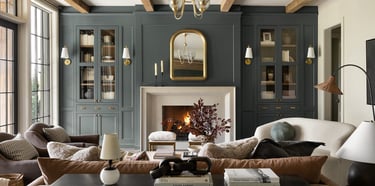 Cozy farmhouse living room with neutral sofa, wood coffee table, and layered textures