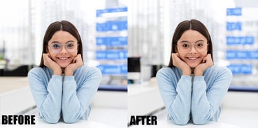 a woman with glasses and a blue sweater