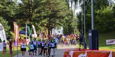 a group of people running in a race