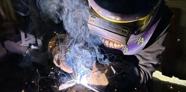 jaspar schirmer welding a steel beam