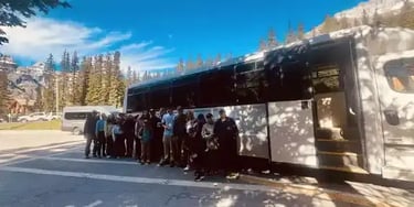 Moraine Lake and Lake Louise day tour shuttle under blue skies