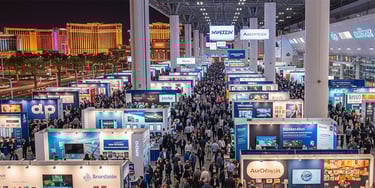 a large group of people standing around a large display of various types of displays