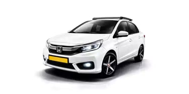 White Honda Amaze one way taxi by Saini taxi services with a luggage carrier rack