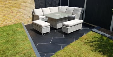 Corner Triangle Garden With Black & Grey Limestone Patio Sleeper Retaning Walls Multi-tier Level