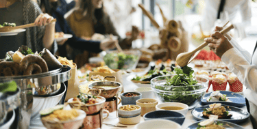 a buffet table with a variety of food items- catering solutions