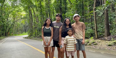 A group of people in the Man-made Forest of Bohol, Philippines.
