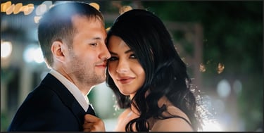 a man and woman standing next to each other