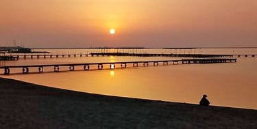 Dawn breaks in the coastal town of Santiago de la Ribera. Total calm usually reigns in the waters of