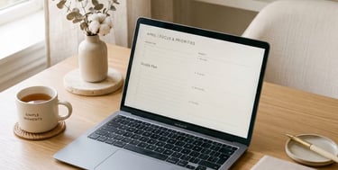 Workspace with laptop and notebook for planning income beyond beauty client appointments