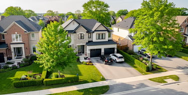 Aerial view of a modern home within a large modern house in a residential neighbourhood