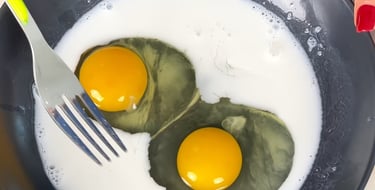 Whisk the eggs with the almond milk