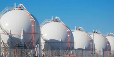a row of white Gases tanks 